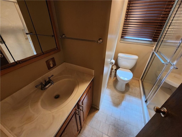 1101 Robinwood Dr, Robinson, IL 62454 - full bath featuring vanity, tile patterned flooring, and a shower with door