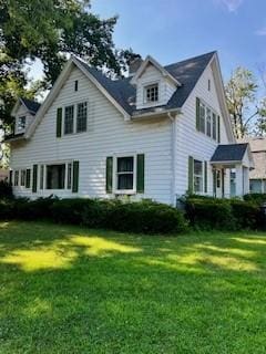 702 Chandler St, Danville, IL 61832 - view of home's exterior featuring a yard