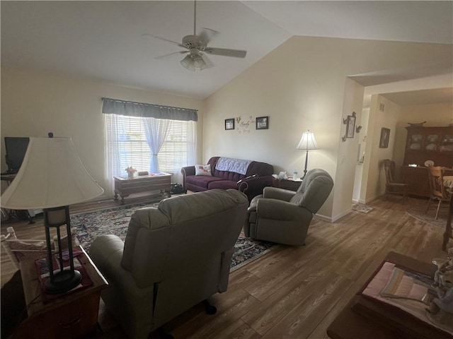 1215 Westside Dr, Mt Zion, IL 62549 - living area featuring vaulted ceiling, ceiling fan, and wood finished floors