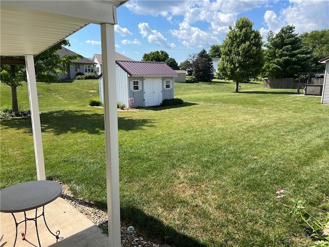 1215 Westside Dr, Mt Zion, IL 62549 - view of grassy yard with a storage unit