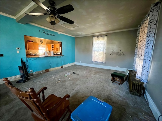 miscellaneous room with ceiling fan, carpet, and ornamental molding