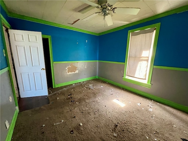 unfurnished bedroom with ceiling fan and crown molding