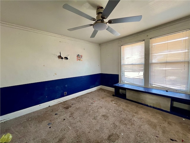 unfurnished room with carpet and ornamental molding