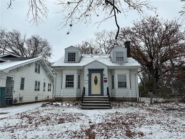 view of new england style home