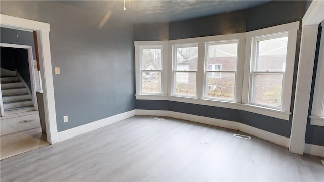 empty room featuring light hardwood / wood-style floors