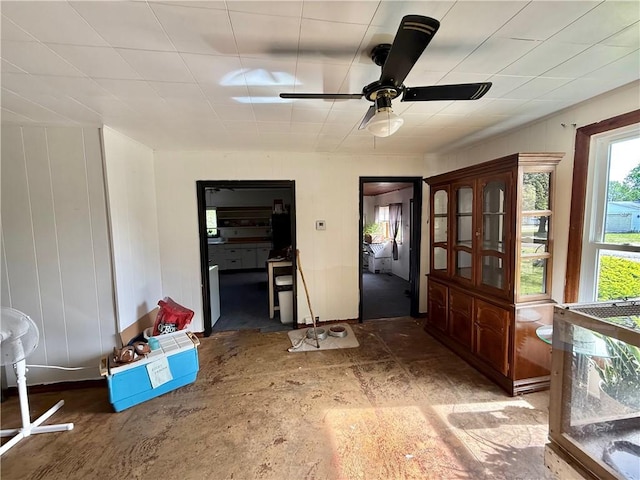 interior space featuring ceiling fan