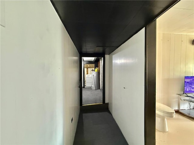hallway featuring water heater