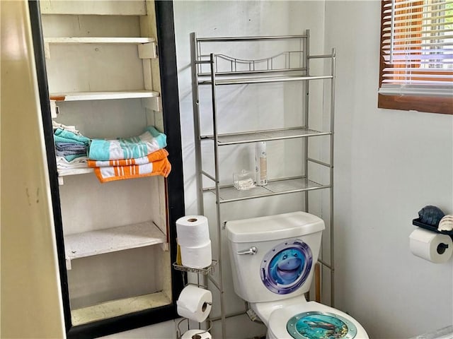 bathroom featuring toilet