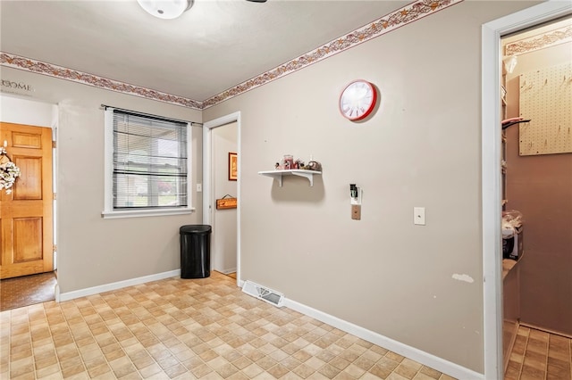 317 Holiday Dr, Decatur, IL 62526 - washroom featuring baseboards