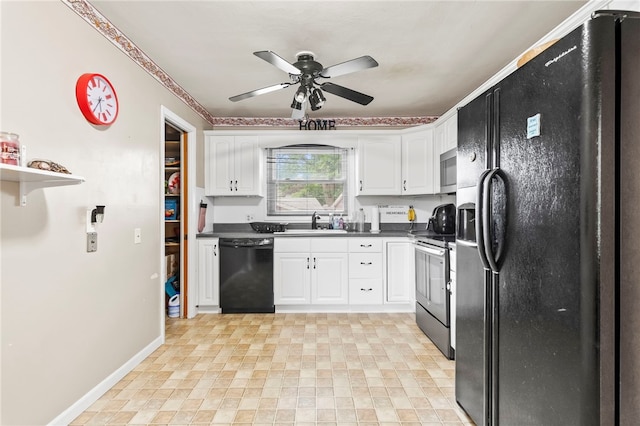 317 Holiday Dr, Decatur, IL 62526 - kitchen with black appliances, a sink, dark countertops, a ceiling fan, and white cabinets