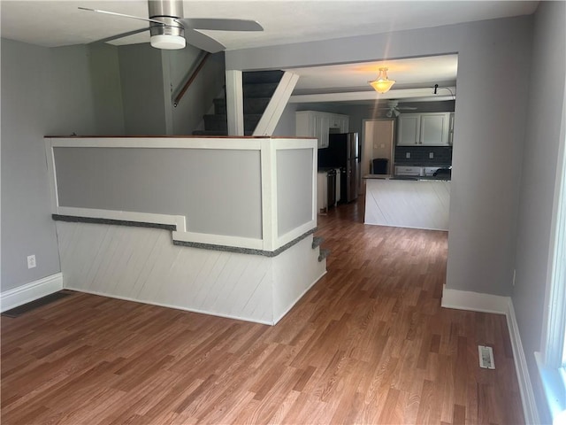 1005 Edgar Ave, Mattoon, IL 61938 - unfurnished living room with ceiling fan and wood finished floors