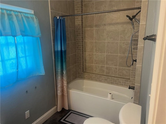 1005 Edgar Ave, Mattoon, IL 61938 - full bathroom featuring toilet and shower / bath combo with shower curtain