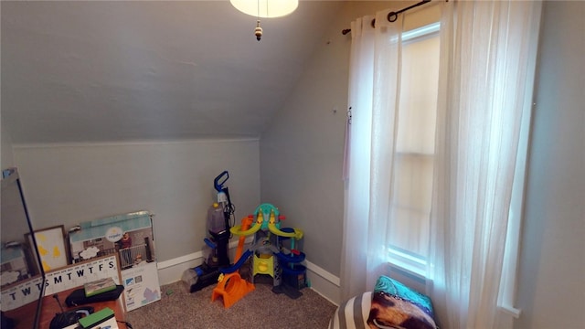 playroom with carpet and lofted ceiling