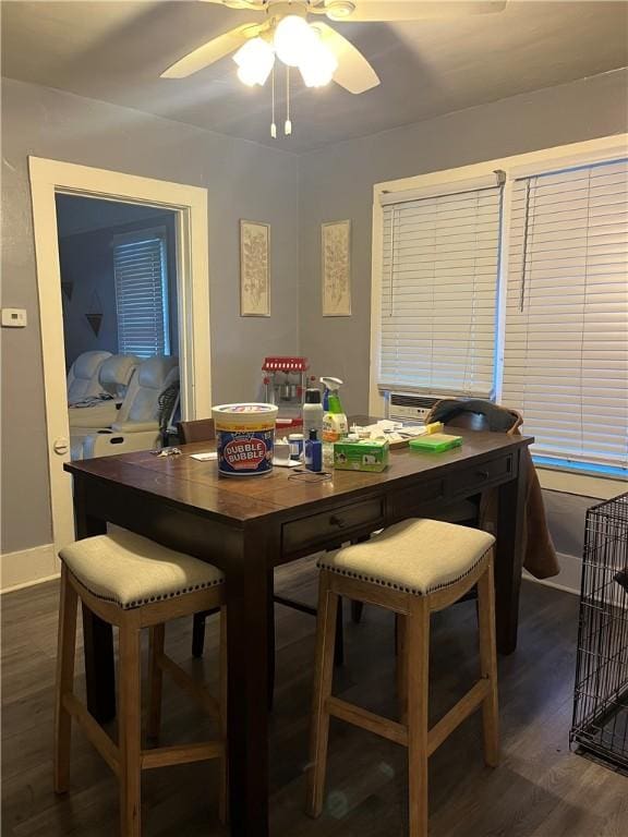 625 S Jackson St, Decatur, IL 62521 - dining area with baseboards, dark wood-style floors, and ceiling fan