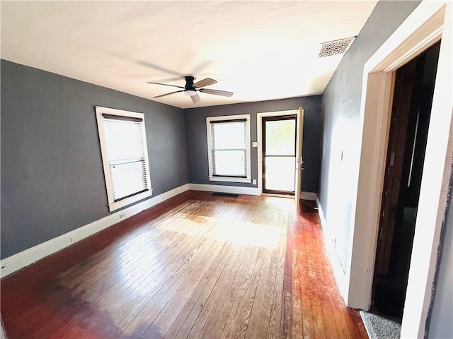 314 W Maple St, Hoopeston, IL 60942 - empty room featuring hardwood / wood-style flooring and ceiling fan