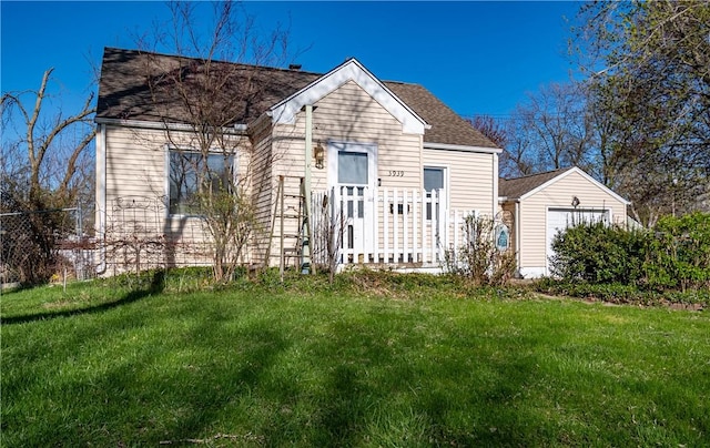 3939 NE Court Dr, Decatur, IL 62526 - view of front facade with a front lawn and a shingled roof