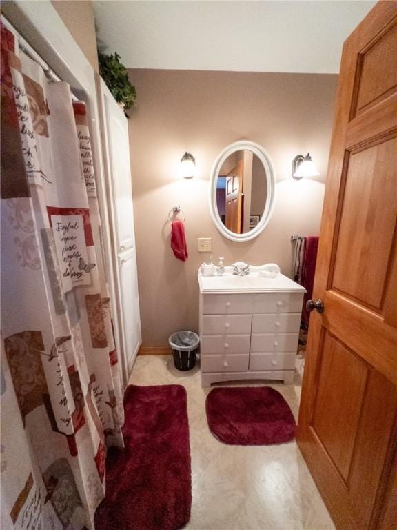 full bath with vanity and a shower with curtain