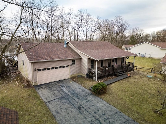 ranch-style home with a front yard, roof with shingles, covered porch, a garage, and aphalt driveway