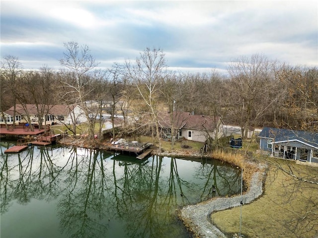 property view of water with a dock