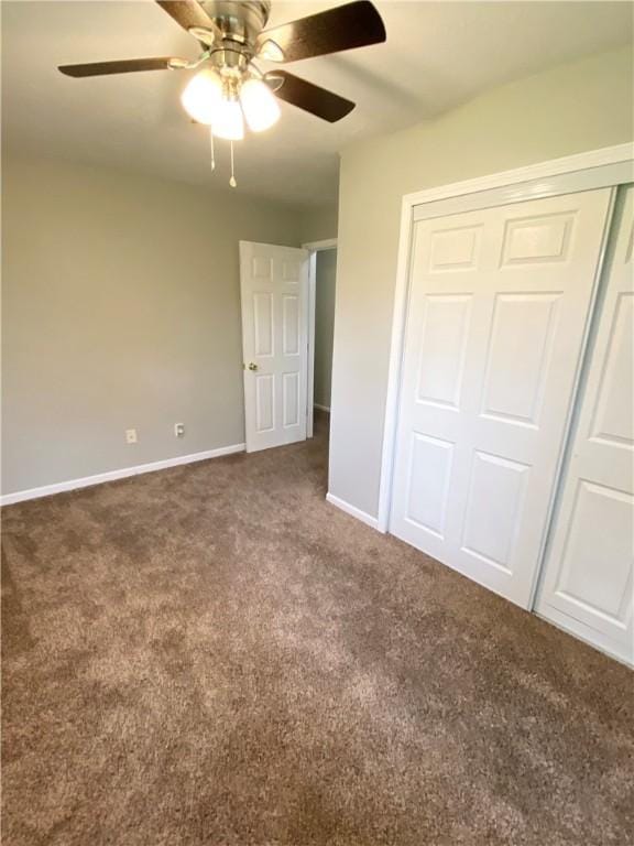 unfurnished bedroom with a ceiling fan, baseboards, a closet, and carpet