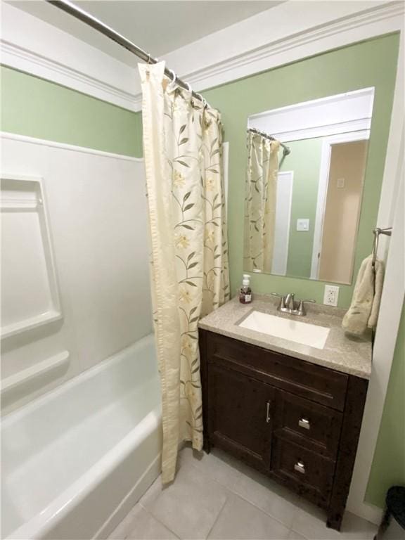 full bathroom featuring vanity, tile patterned flooring, and shower / bath combo with shower curtain