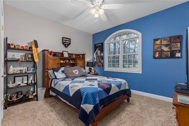 bedroom featuring ceiling fan and carpet floors