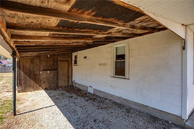 view of patio / terrace featuring an attached carport