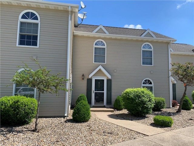 607 Beyers Lake Est, Pana, IL 62557 - view of front of house featuring roof with shingles