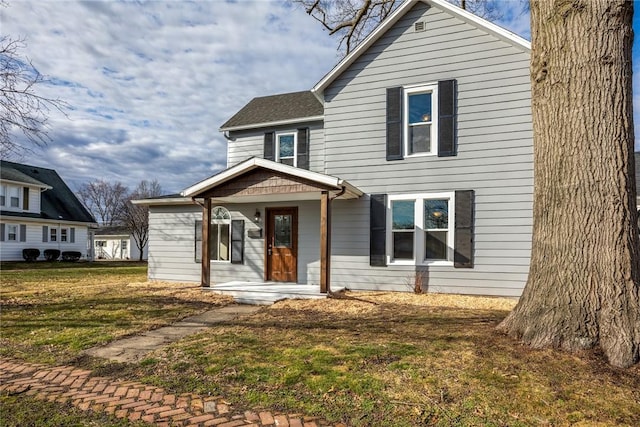 view of front of house with a front lawn