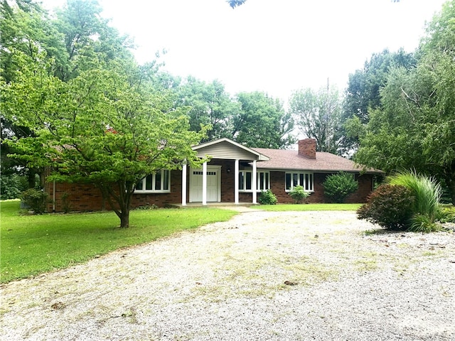 view of front of home with a front lawn