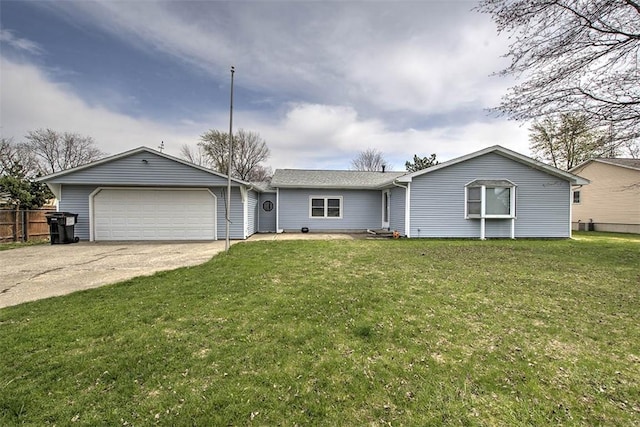 ranch-style home featuring a garage, a front yard, driveway, and fence