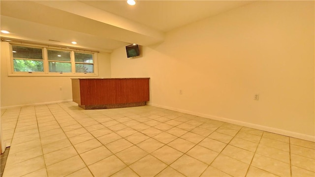 1009 E Grove Pl, Effingham, IL 62401 - unfurnished room featuring recessed lighting, light tile patterned flooring, and baseboards