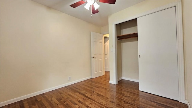 1009 E Grove Pl, Effingham, IL 62401 - unfurnished bedroom with wood finished floors, baseboards, a closet, and a ceiling fan