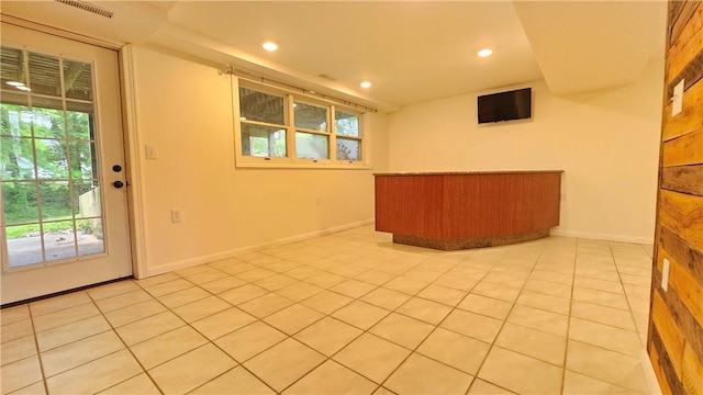 1009 E Grove Pl, Effingham, IL 62401 - unfurnished room featuring plenty of natural light, recessed lighting, light tile patterned flooring, and baseboards