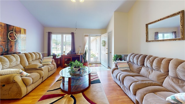 3121 Stoneridge Ct, Danville, IL 61832 - living room featuring vaulted ceiling and light wood-style floors
