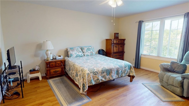 3121 Stoneridge Ct, Danville, IL 61832 - bedroom with light wood-style flooring and a ceiling fan