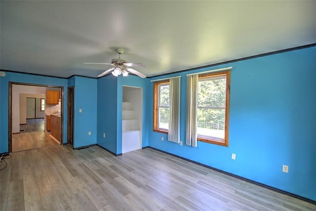 6145 Sangamon Rd, Decatur, IL 62521 - spare room featuring light wood-style floors and a ceiling fan