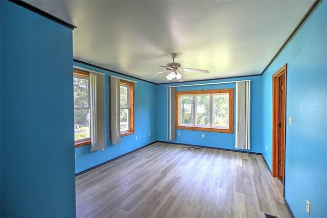 6145 Sangamon Rd, Decatur, IL 62521 - unfurnished room featuring wood finished floors and a ceiling fan