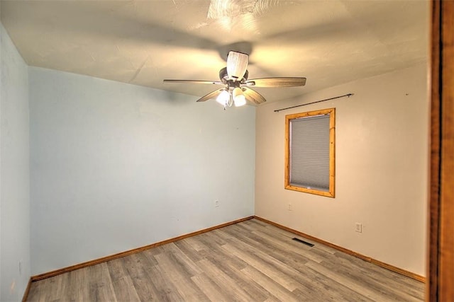 6145 Sangamon Rd, Decatur, IL 62521 - spare room featuring light wood-style flooring and a ceiling fan