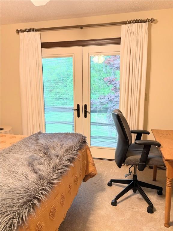 2236 Seneca Dr, Charleston, IL 61920 - bedroom featuring access to exterior, carpet, and french doors