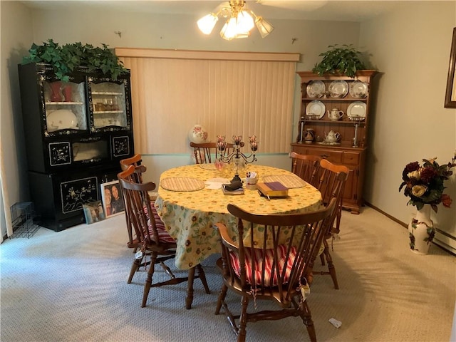 603 W English St, Danville, IL 61832 - dining space featuring light carpet and a ceiling fan