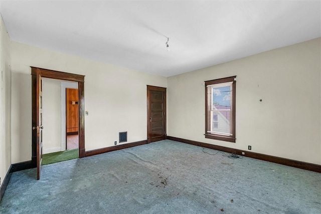 426 W Madison St, Paris, IL 61944 - carpeted spare room featuring baseboards