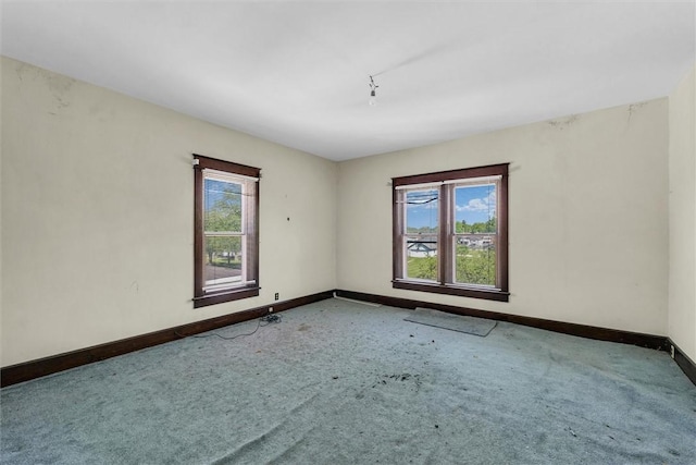 426 W Madison St, Paris, IL 61944 - carpeted empty room with baseboards