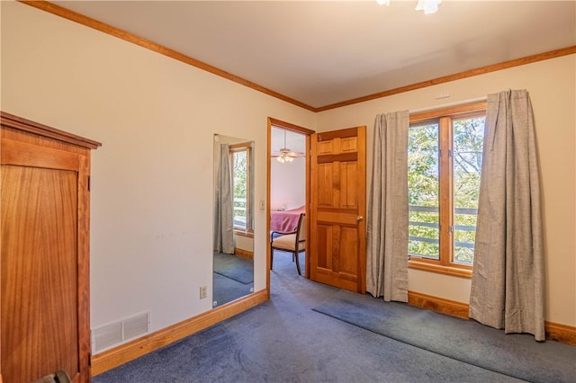 5353 E Reas Bridge Rd, Decatur, IL 62521 - carpeted empty room featuring healthy amount of natural light, baseboards, and ornamental molding