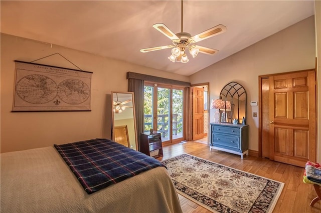 5353 E Reas Bridge Rd, Decatur, IL 62521 - bedroom with wood-type flooring, vaulted ceiling, and a ceiling fan