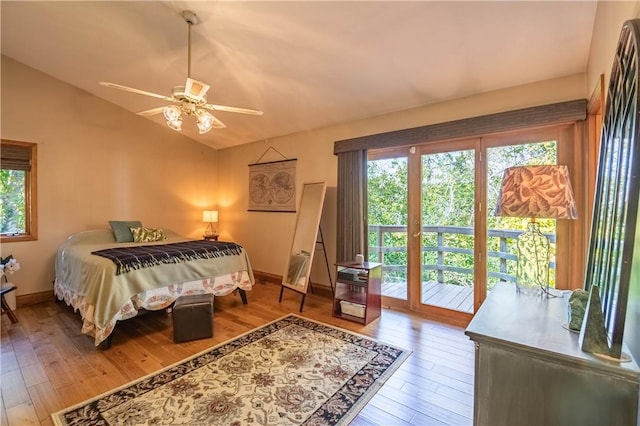 5353 E Reas Bridge Rd, Decatur, IL 62521 - bedroom featuring access to exterior, vaulted ceiling, hardwood / wood-style floors, baseboards, and ceiling fan