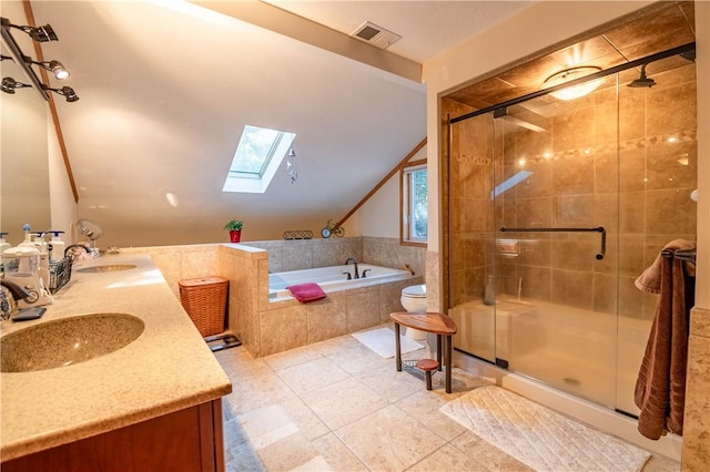 5353 E Reas Bridge Rd, Decatur, IL 62521 - bathroom with a skylight, lofted ceiling, a bath, a shower stall, and tile patterned floors