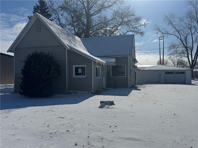 exterior space with a detached garage