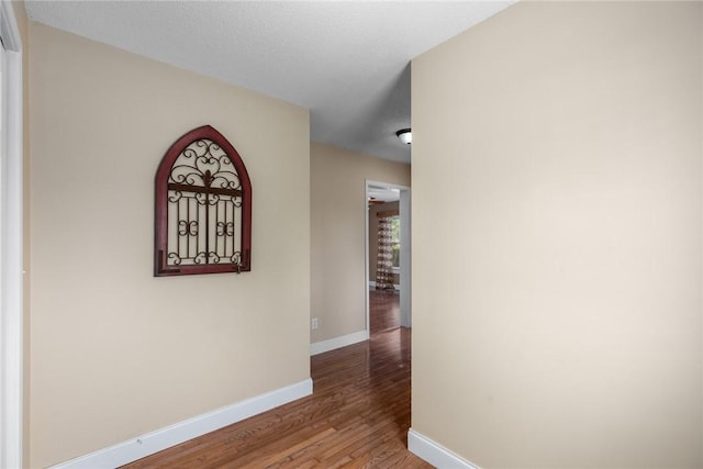 510 N Merchant St, Effingham, IL 62401 - hallway with baseboards and wood finished floors