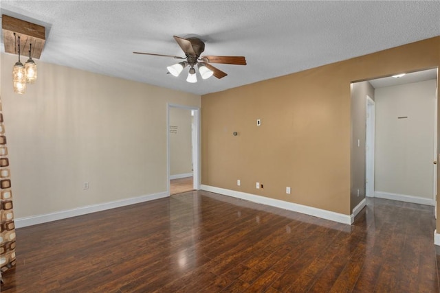 510 N Merchant St, Effingham, IL 62401 - spare room with ceiling fan, wood finished floors, baseboards, and a textured ceiling